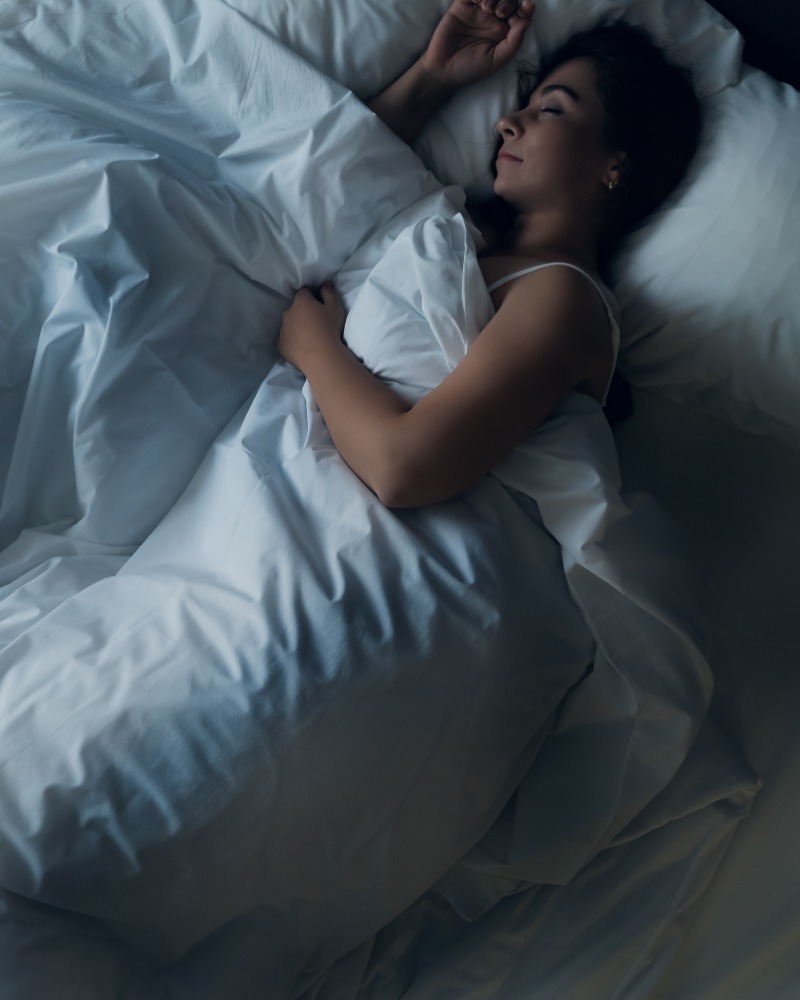 young-beautiful-girl-or-woman-sleeping-alone-in-big-bed-at-night-top-picture-800x1000.jpg