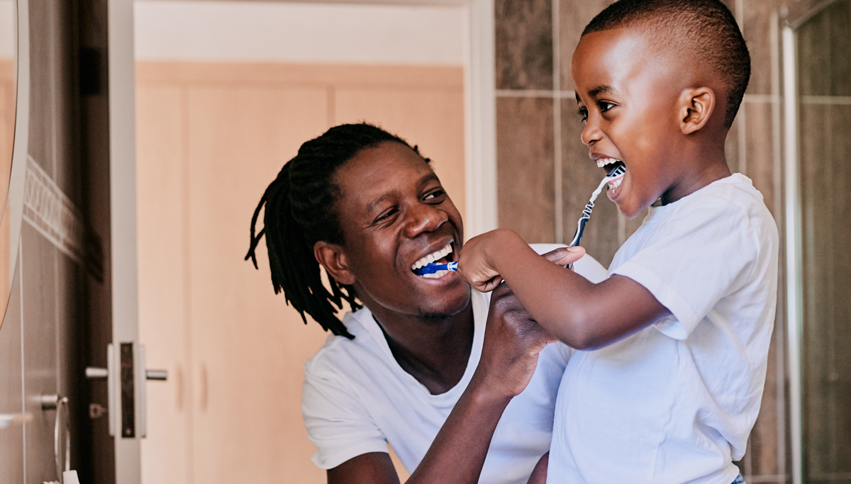 father-and-son-brushing-teeth-1200x683.png
