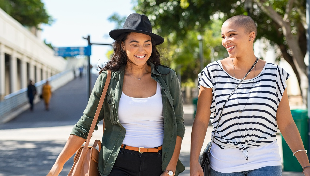 two-women-smiling-outside-1200x683.webp