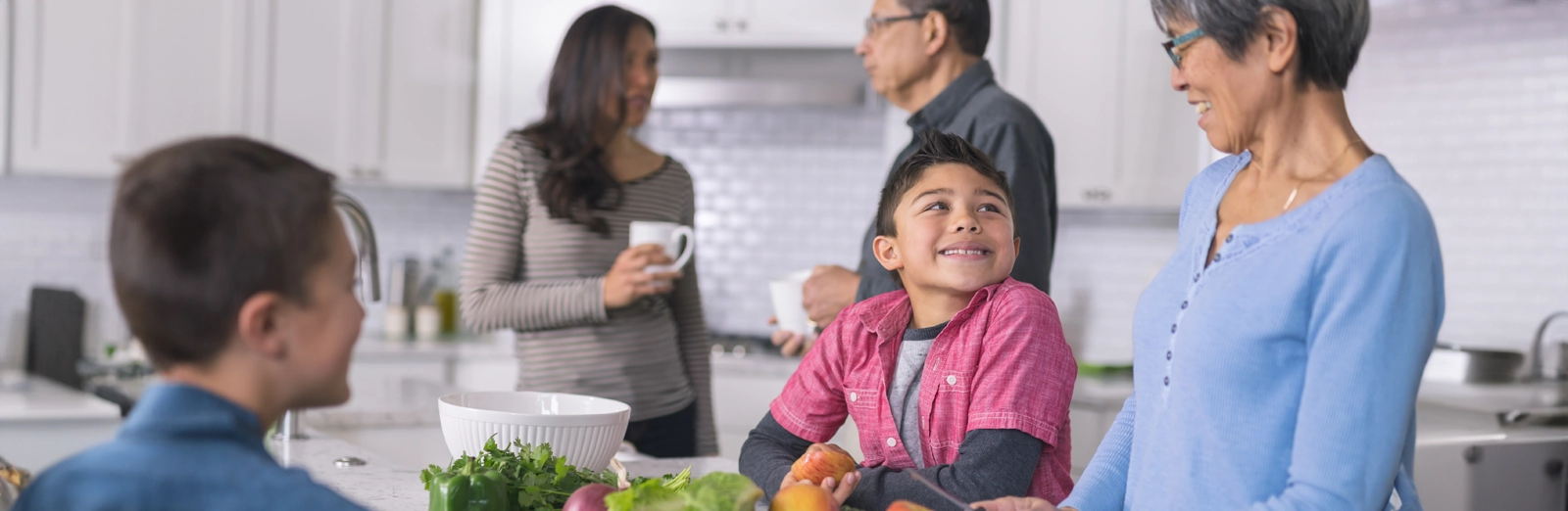 A family preparing food in a kitchen
