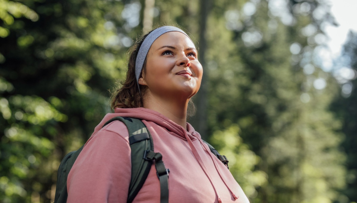 portrait-of-a-beautiful-woman-hiker-smiling-picture-id1200x683.jpg