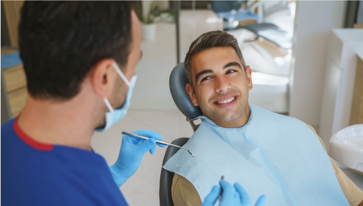 young-man-patient-having-dental-treatment-at-dentists-office-.picture.-id1200x683.jpg