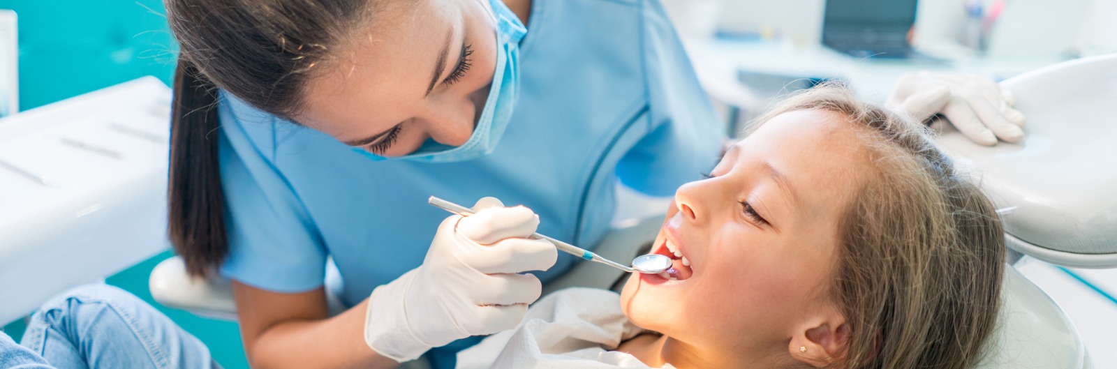 beautiful-girl-at-the-dentist-picture-1600x529.jpg