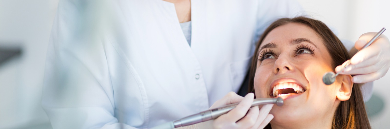 A woman having a dental exam