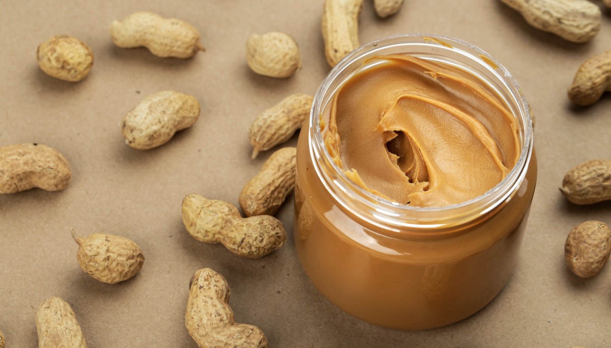 creamy-and-smooth-peanut-butter-in-jar-on-paper-table-picture-1200x683.jpg
