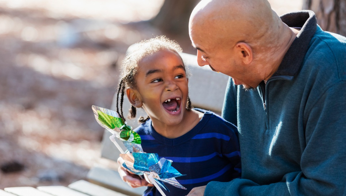 little-boy-and-father-playing-with-pinwheel-toys-picture-1200x683.jpg