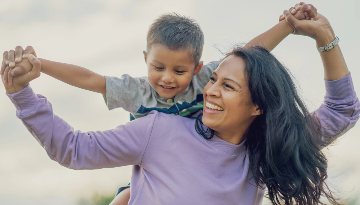 mother-and-son-playing-outside-1200x683.webp