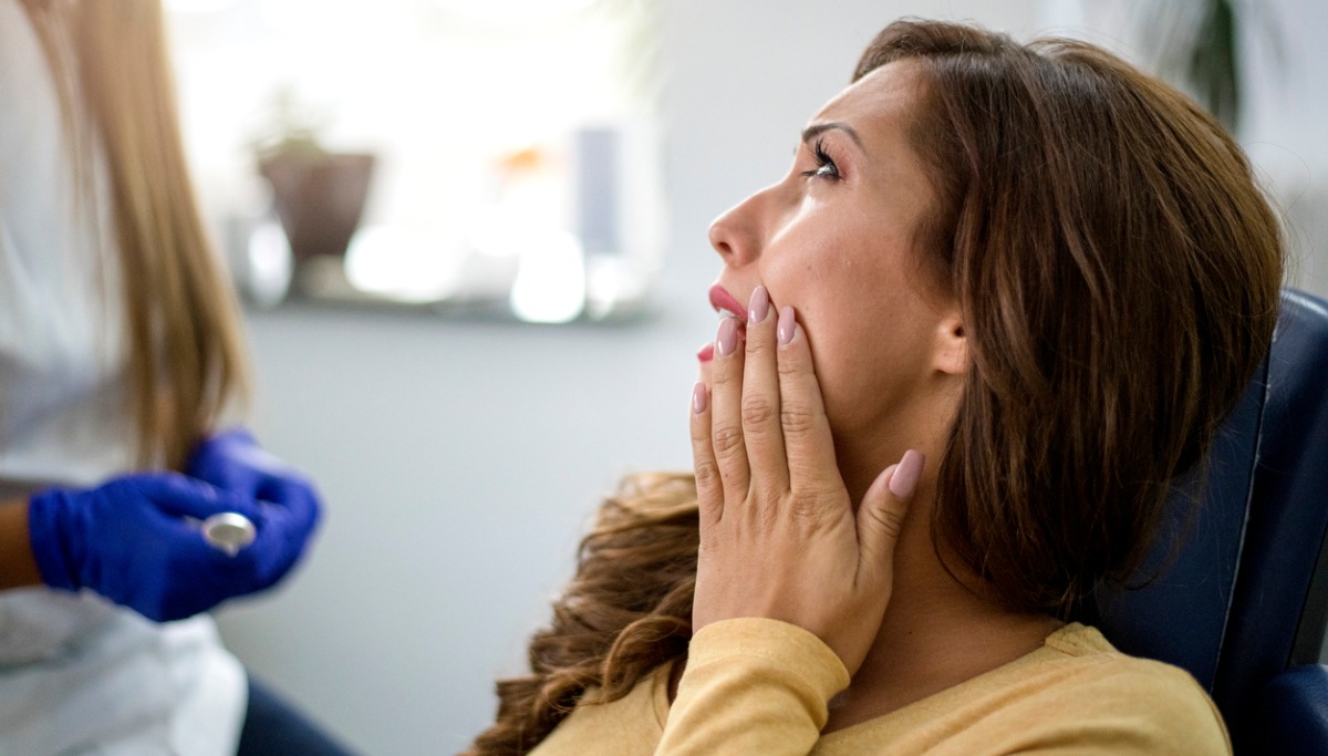 young-woman-with-toothache-picture- 1200x683 thumbnail.jpg