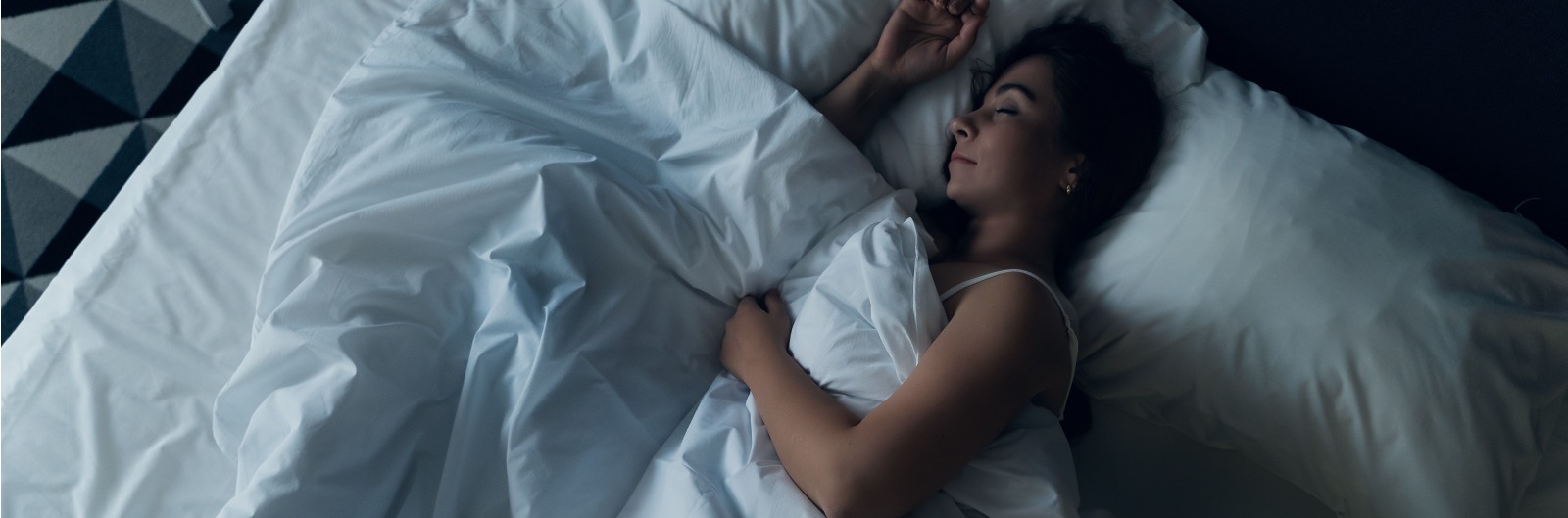 A woman laying in a bed