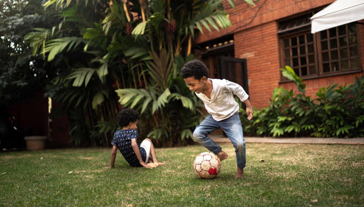 brothers-playing-soccer-in-the-backyard-picture-1200x683.jpeg