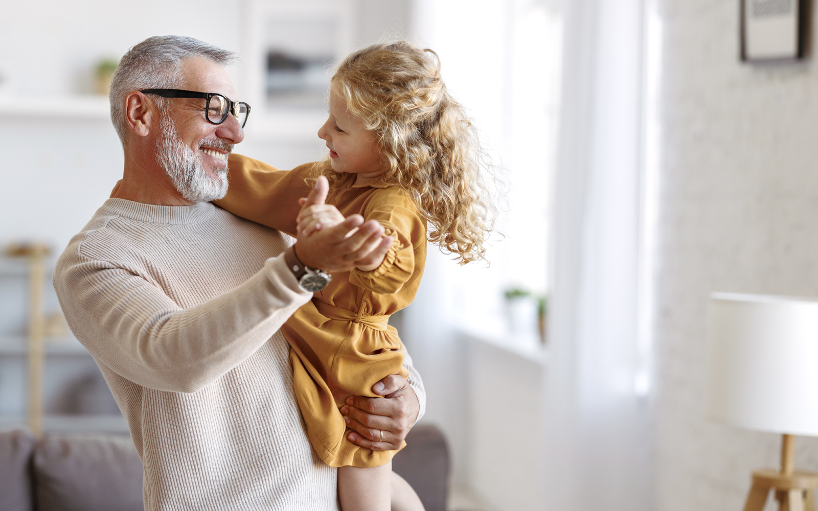 Grandfather-and-granddaughter-dancing-tablet-1600x1000.jpg