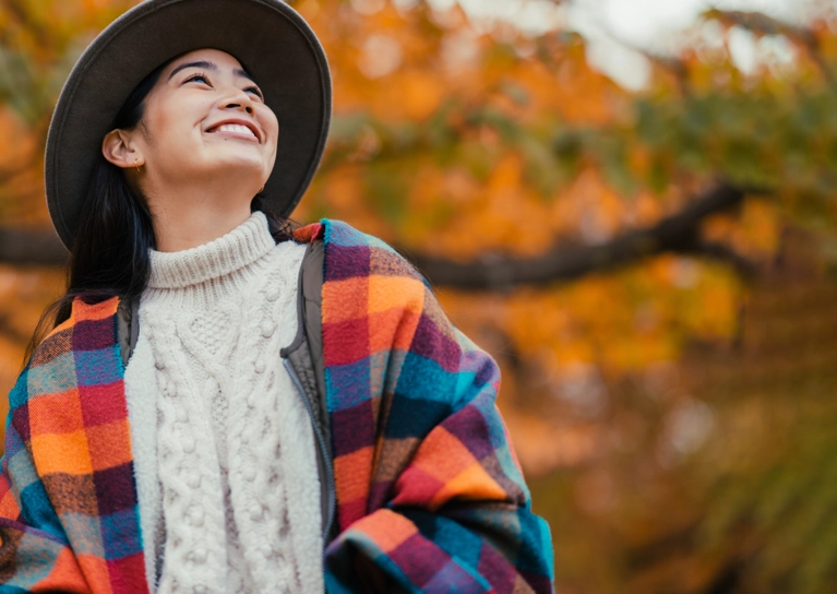 woman-smiling-outside-mobile-767x544.webp
