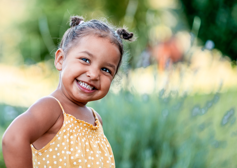young-girl-smiling-mobile-767x544.png