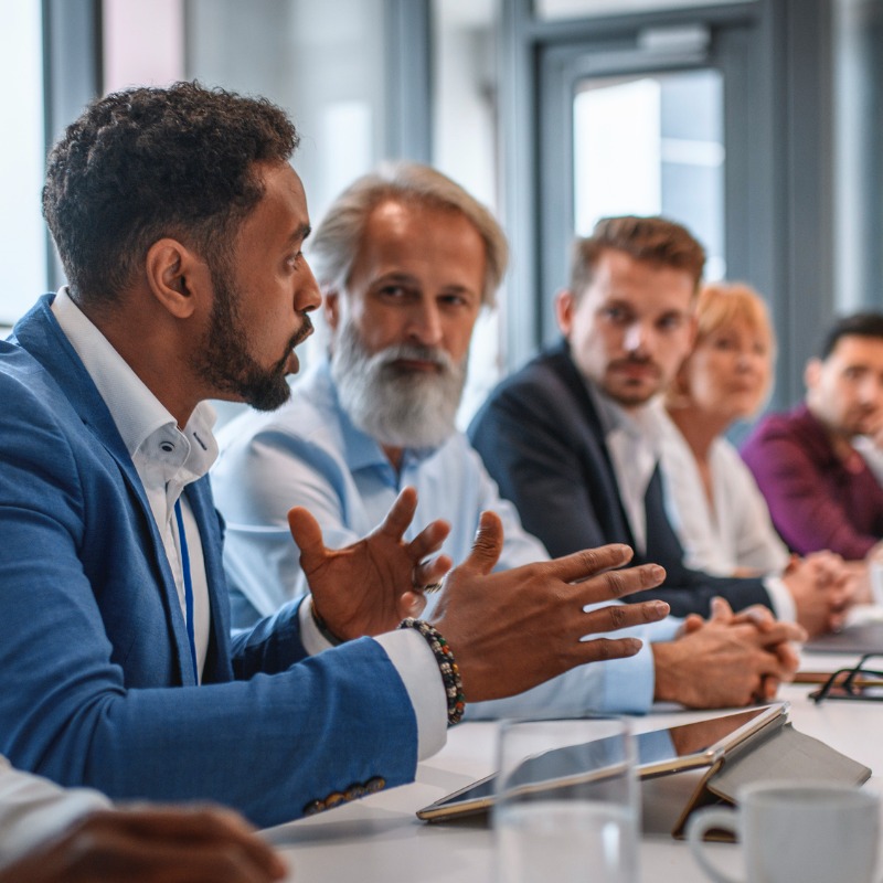 executive-team-listening-to-contrary-views-from-colleague-picture-800x800.jpg