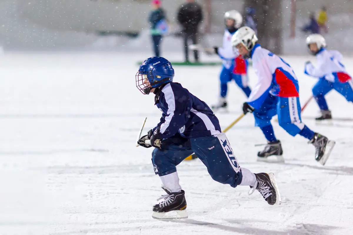 Youth hockey players wearing a mouthguard