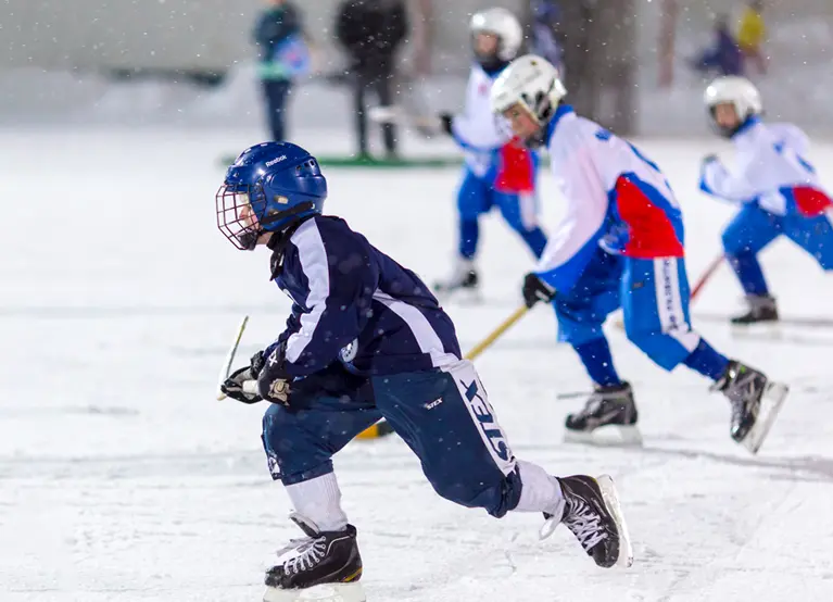 Youth hockey players wearing a mouthguard