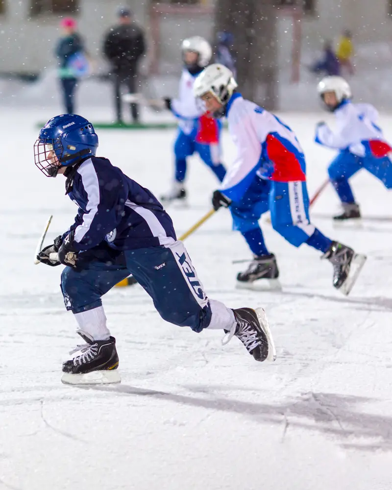 Youth hockey players wearing a mouthguard