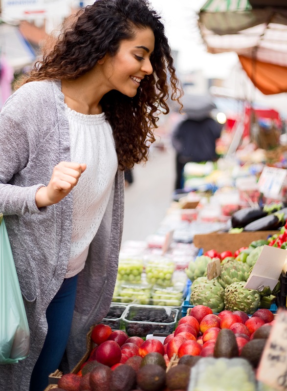 young woman shopping at the market