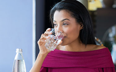 woman-drinking-water_376x234.jpg