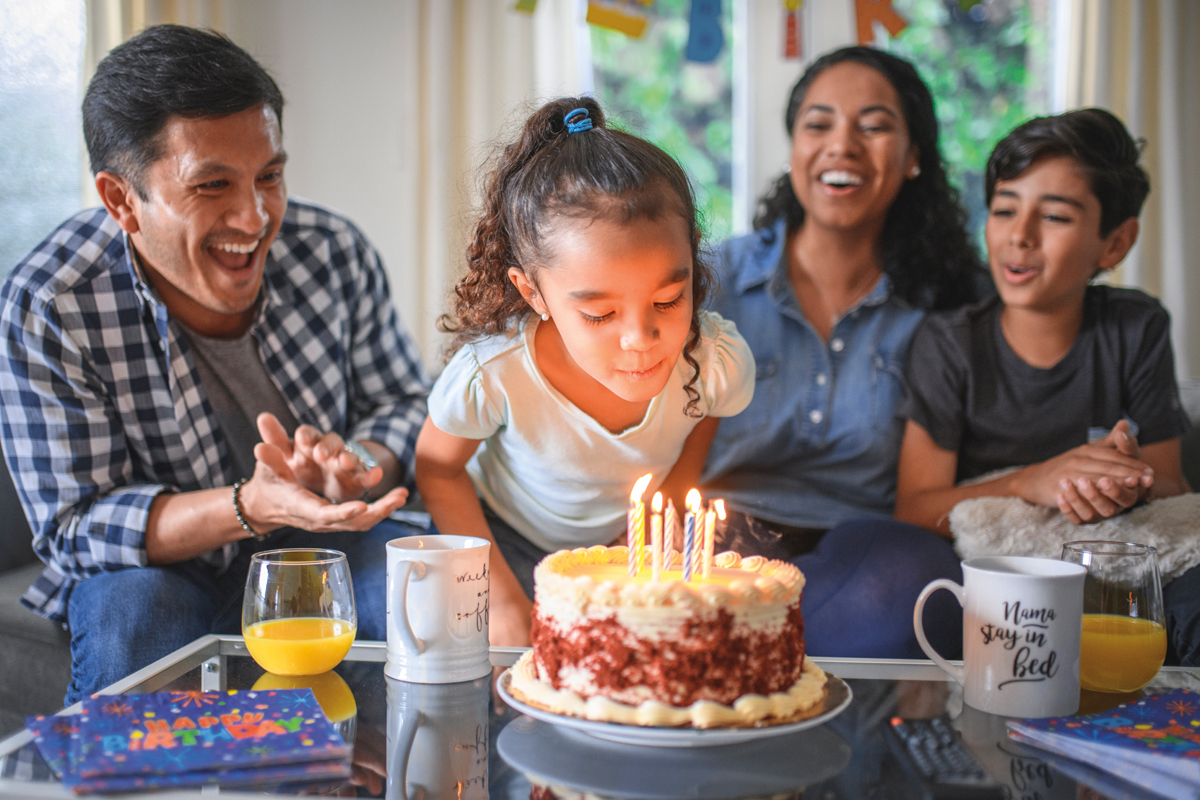 girl-blowing-out-candles-1200x800.jpg