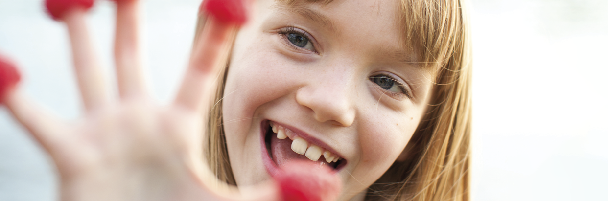 girl-with-berries-1242x411.png