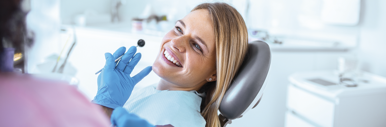 woman-in-dental-chair-1242x411.png