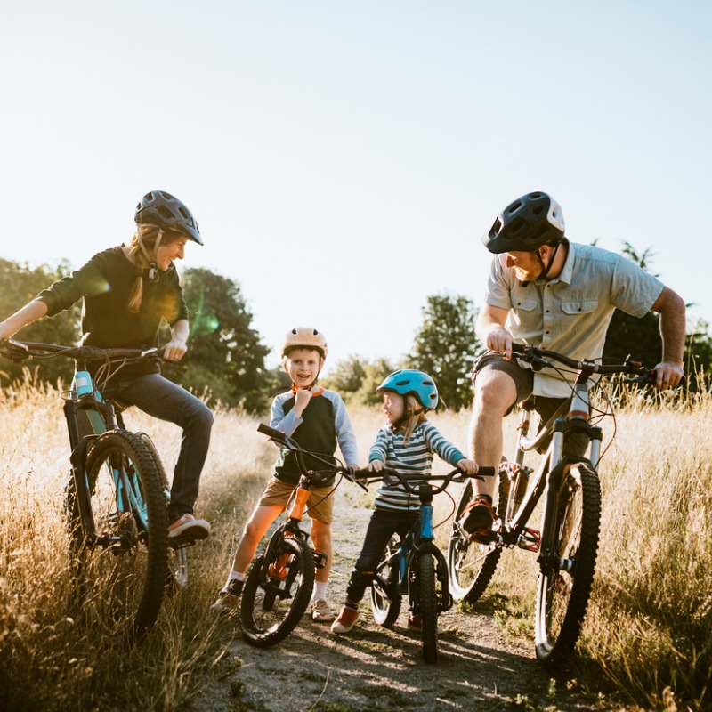 family-mountain-bike-riding-together-on-sunny-day-picture-800x800.jpg